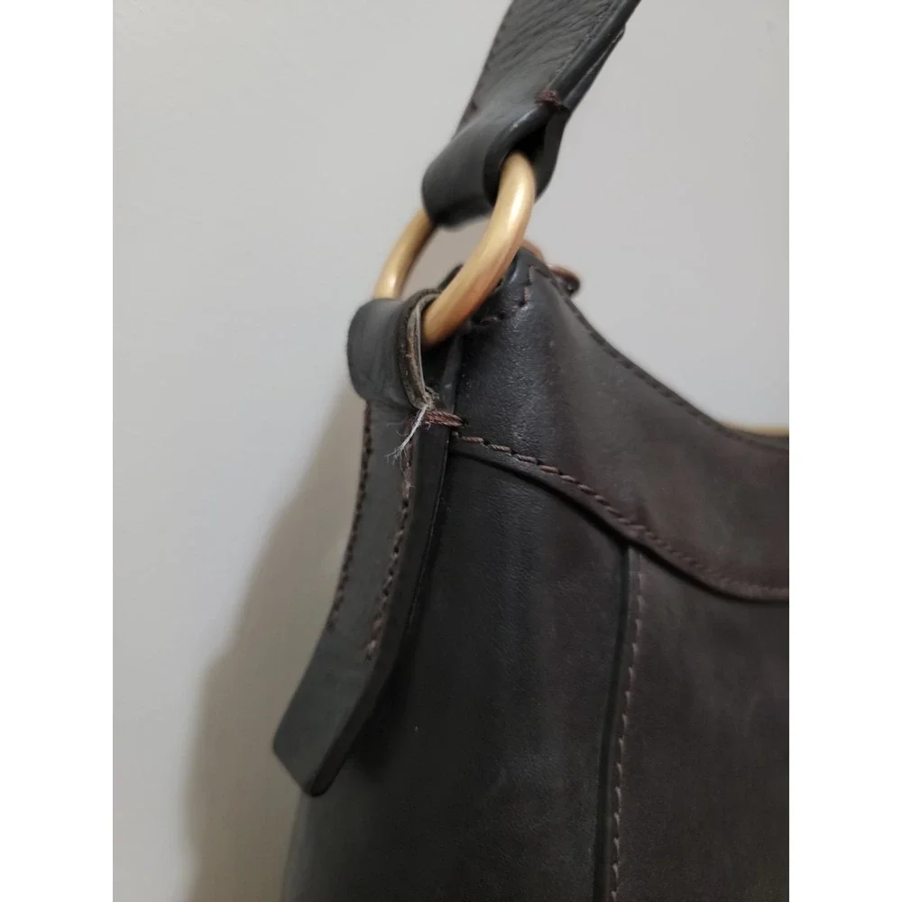 Dooney & Bourke Genuine Florentine Cassidy Hobo Shoulder Bag. Black Leather